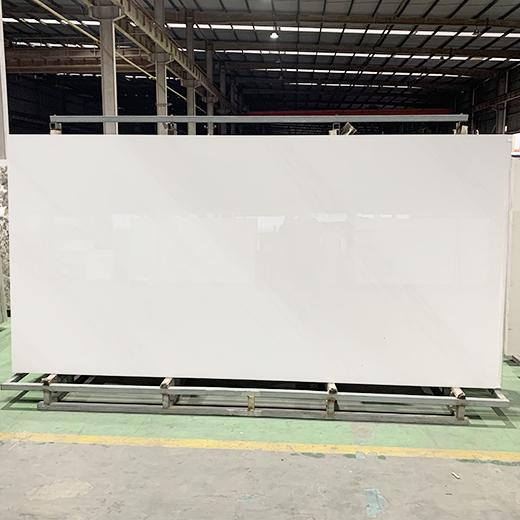 Polished white sintered stone cook top backsplash